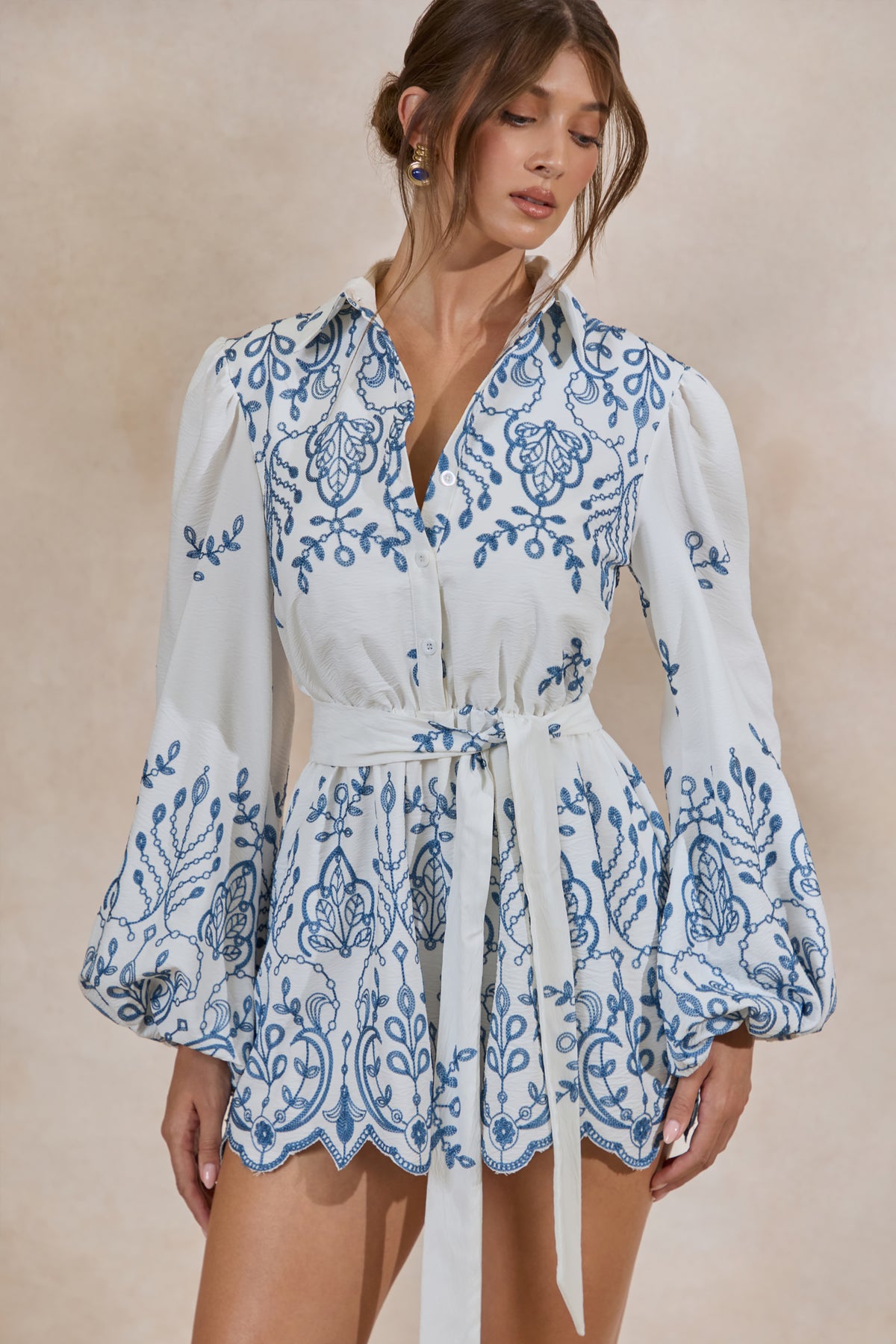ECM_HR_CL138214110---Adria-_-White-And-Blue-Floral-Broderie-V-Neck-Playsuit2.jpg