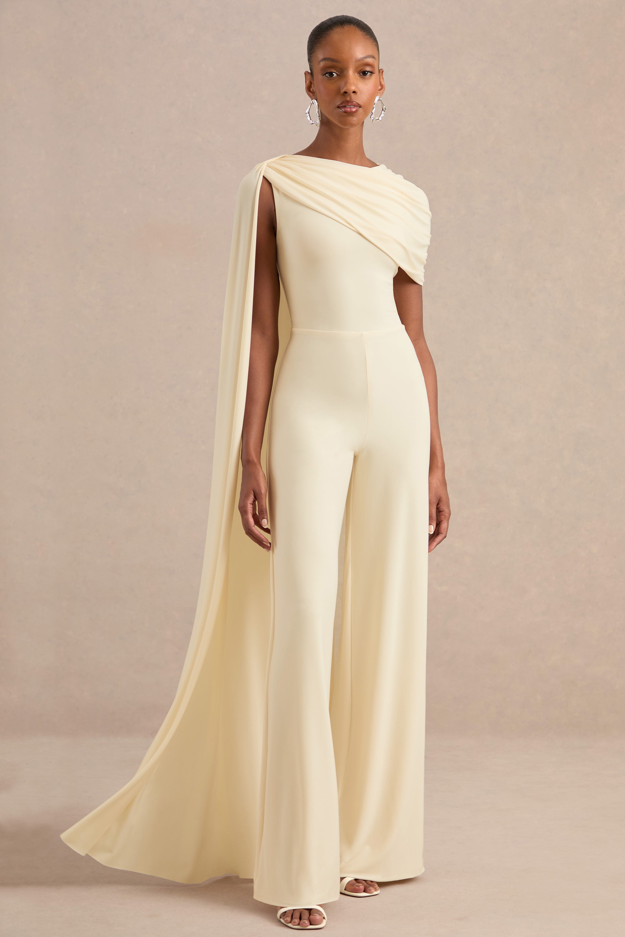 ECM_HR_CL138262111 - Emelisse Cream Round-Neck Jumpsuit With Gathered Detailing And Sash1.jpg