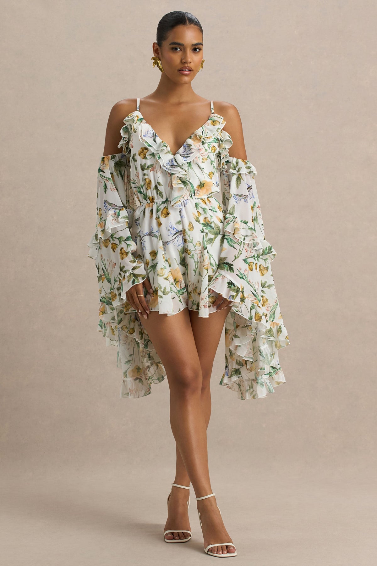 Anaya | Vit kort byxdress med citrongult blommönster och lång ärm
