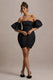 Ramone | Svart miniklänning med bardothalsringning och voluminösa puffärmar