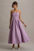 Annalise | Lila axelbandslös midiklänning med klockad kjol
