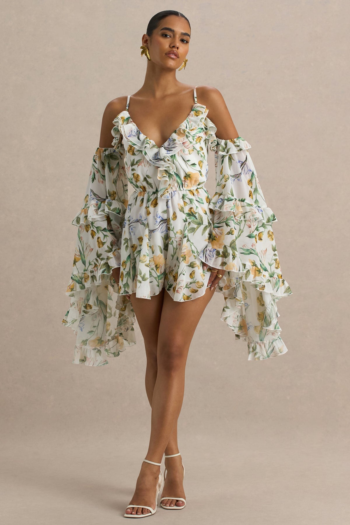 Anaya | Vit kort byxdress med citrongult blommönster och lång ärm