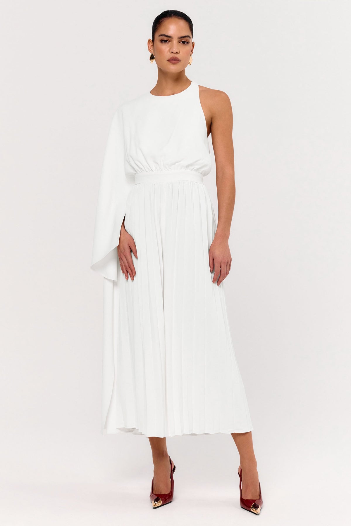 Paradise | Vit byxdress med capeärm