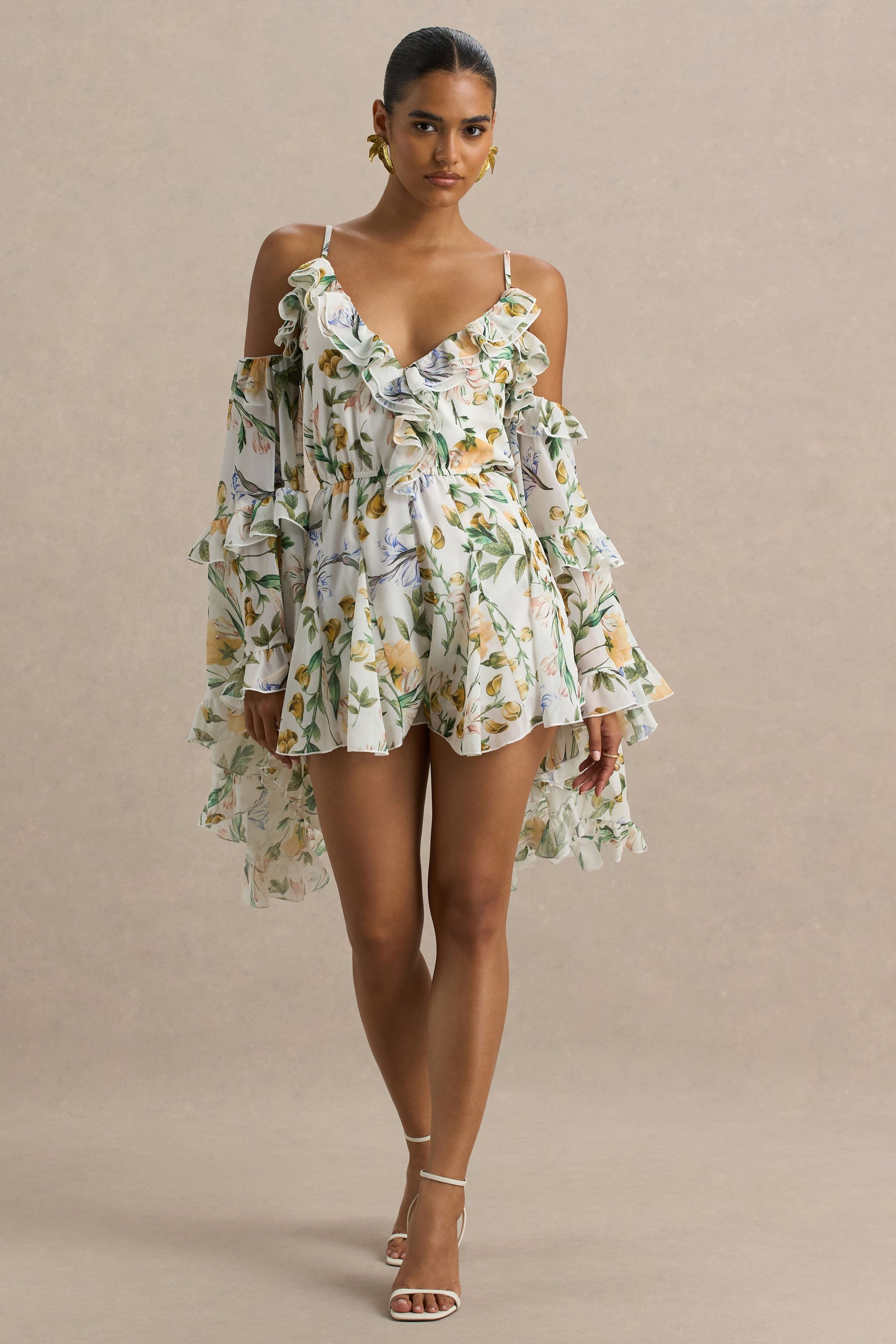 Anaya | Vit kort byxdress med citrongult blommönster och lång ärm