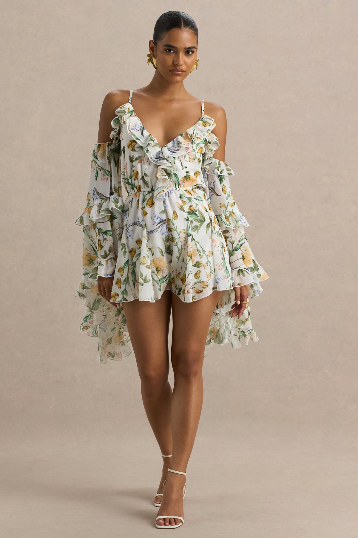Anaya | Vit kort byxdress med citrongult blommönster och lång ärm