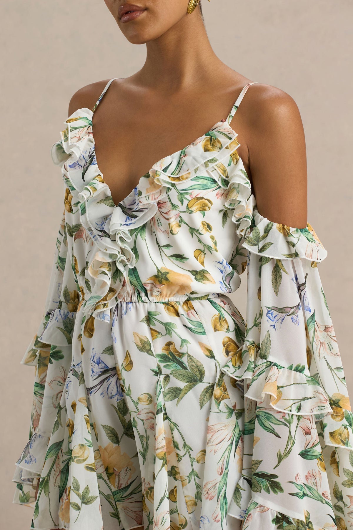 Anaya | Vit kort byxdress med citrongult blommönster och lång ärm