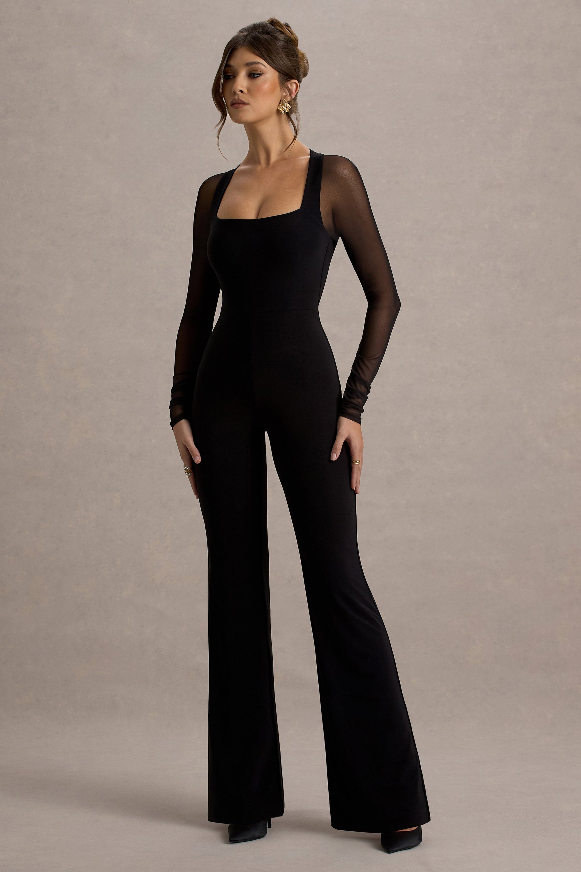 On Track | Svart byxdress med utsvängda ben och transparenta ärmar