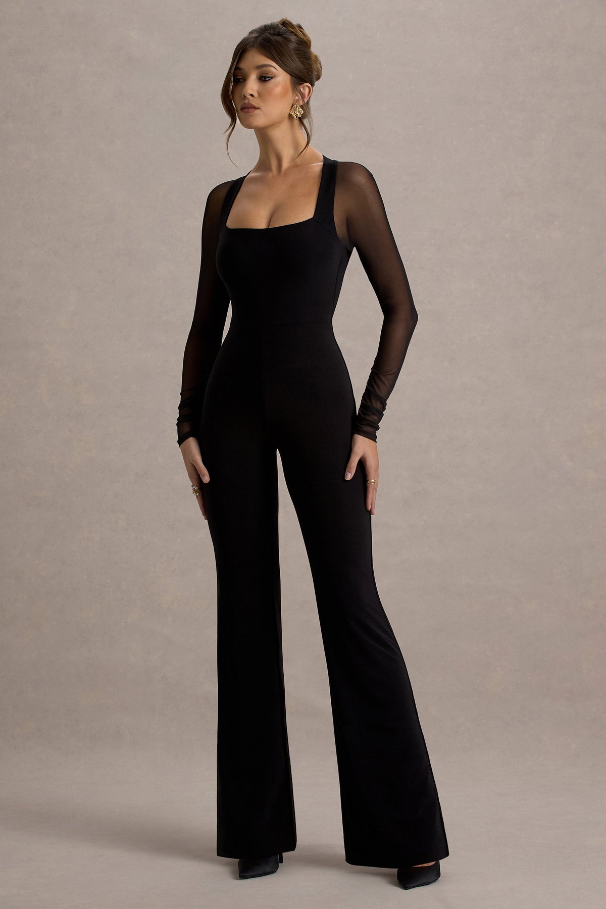 On Track | Svart byxdress med utsvängda ben och transparenta ärmar