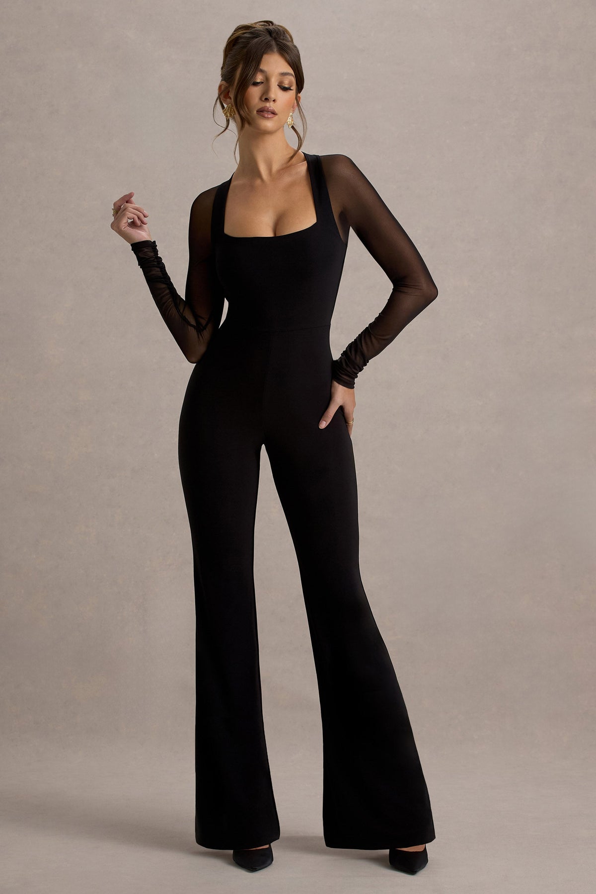 On Track | Svart byxdress med utsvängda ben och transparenta ärmar