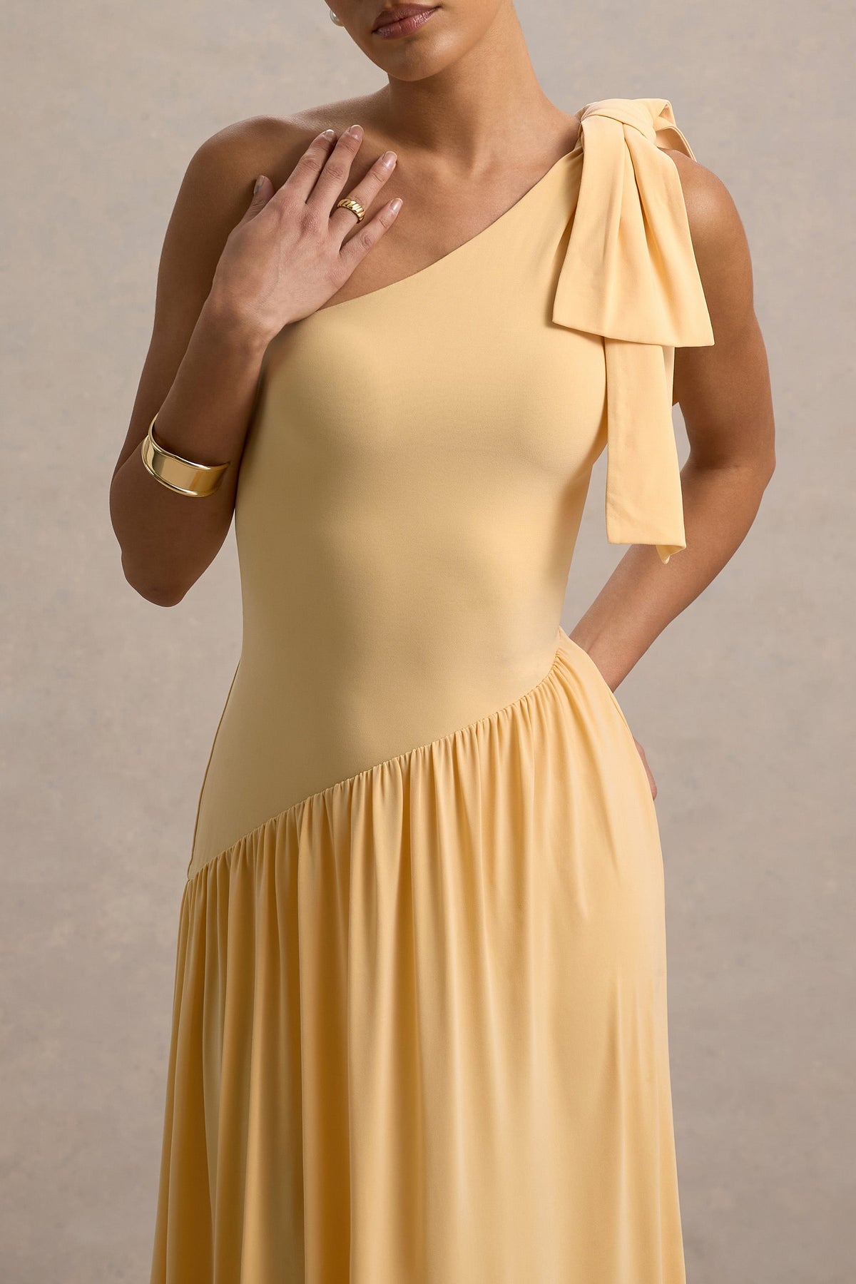 Lotus Love | Orange asymmetrisk långklänning med rosett
