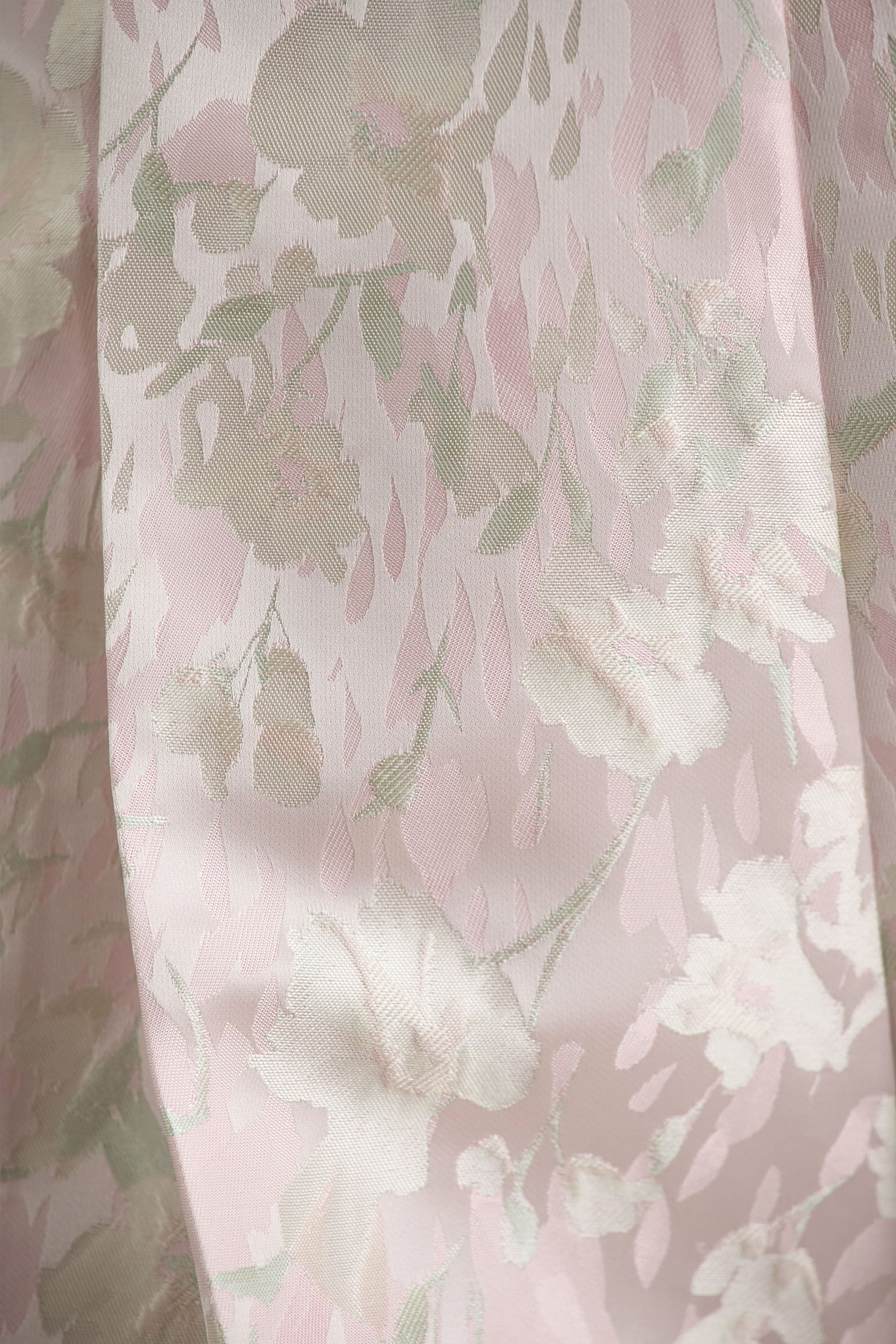 Sharie | Krämvit blommönstrad kort byxdress med halterneck