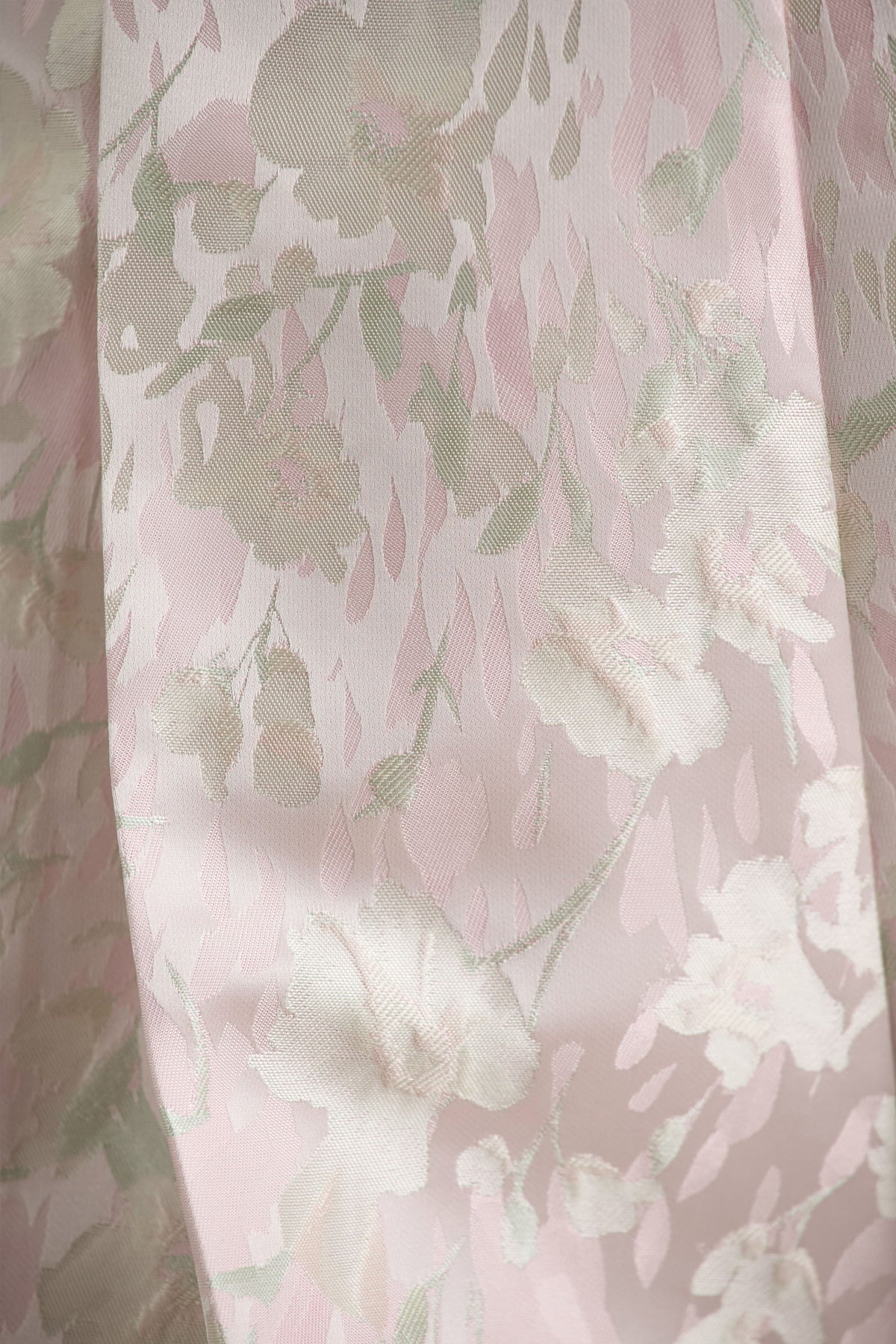 Sharie | Krämvit blommönstrad kort byxdress med halterneck